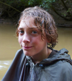 poncho green wet river hiking